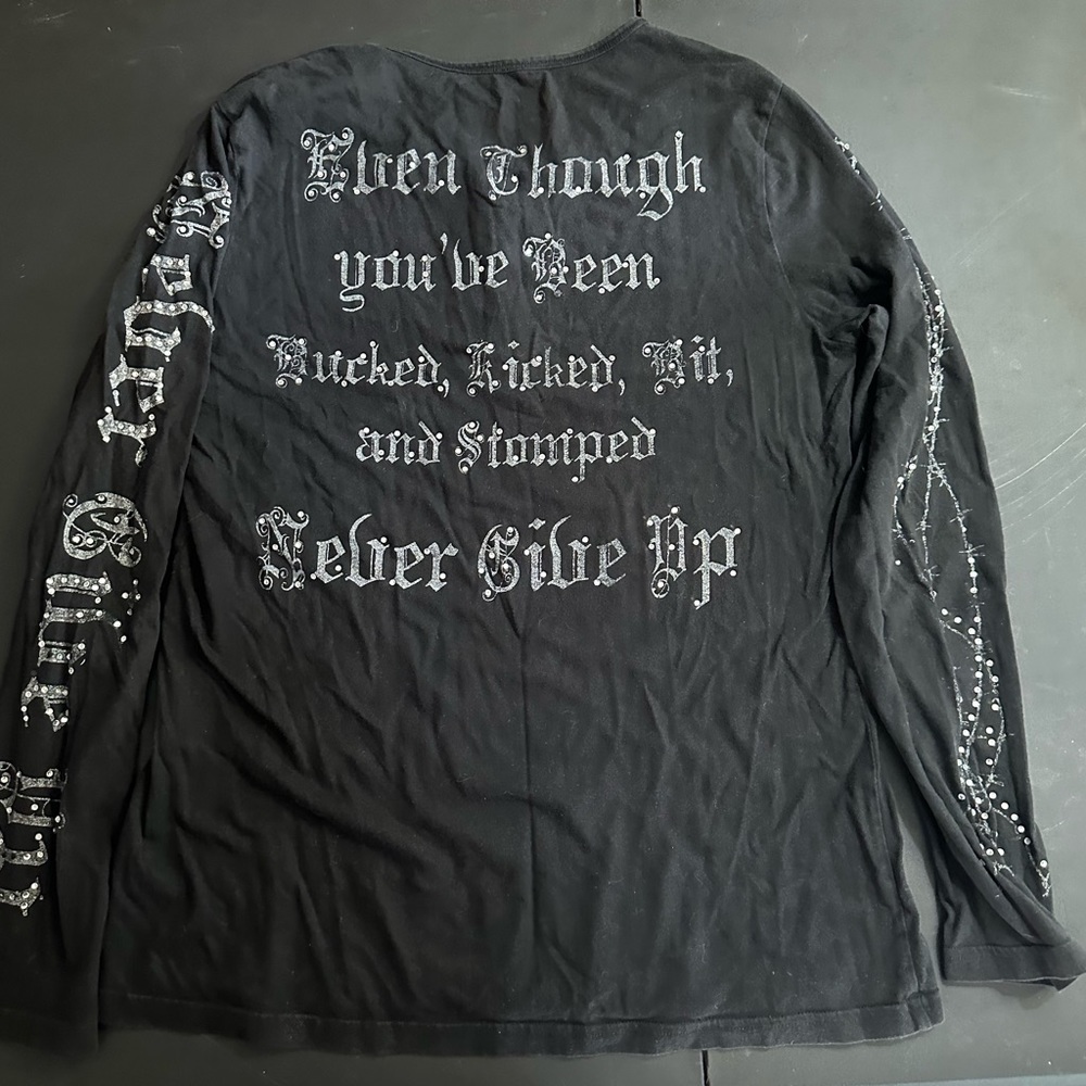 Cowgirl Tuff black bedazzled long sleeve shirt.